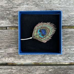 Peacock feather broche
